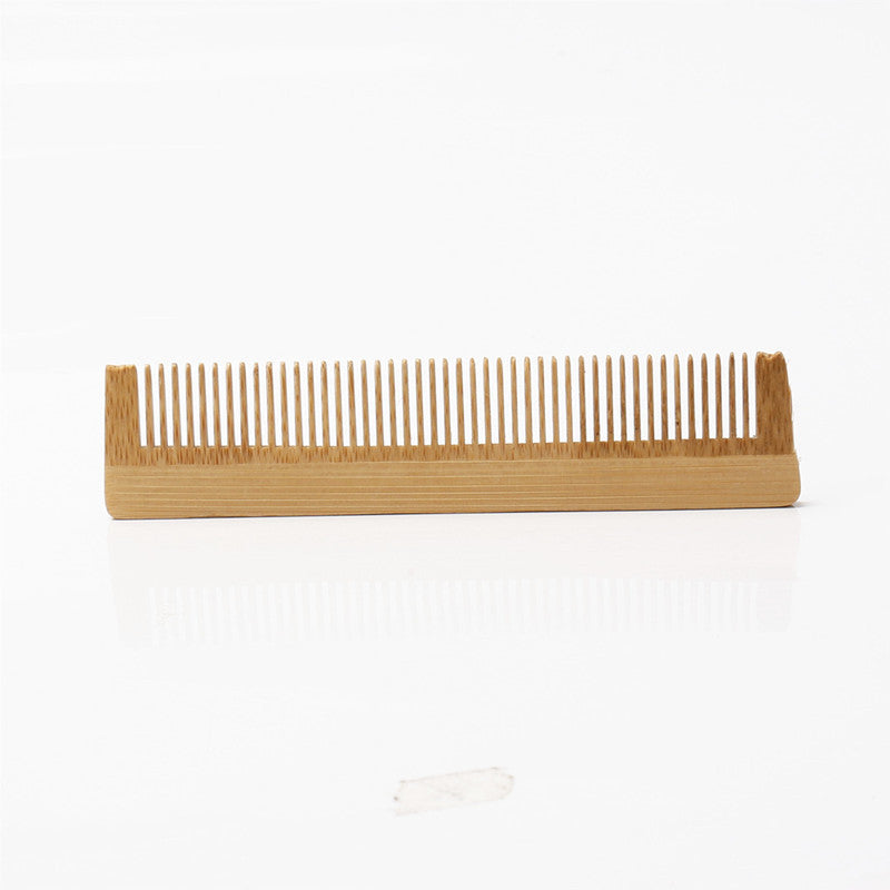 Wooden comb with bamboo handle
