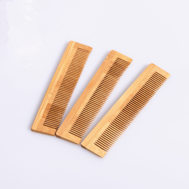 Wooden comb with bamboo handle